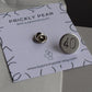 A sleek silver number 40 birthday badge. Badge uses a butterfly back which is shown behind the pin.