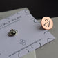 A sleek 21st Birthday badge in copper. Butterfly back shown in the background.
